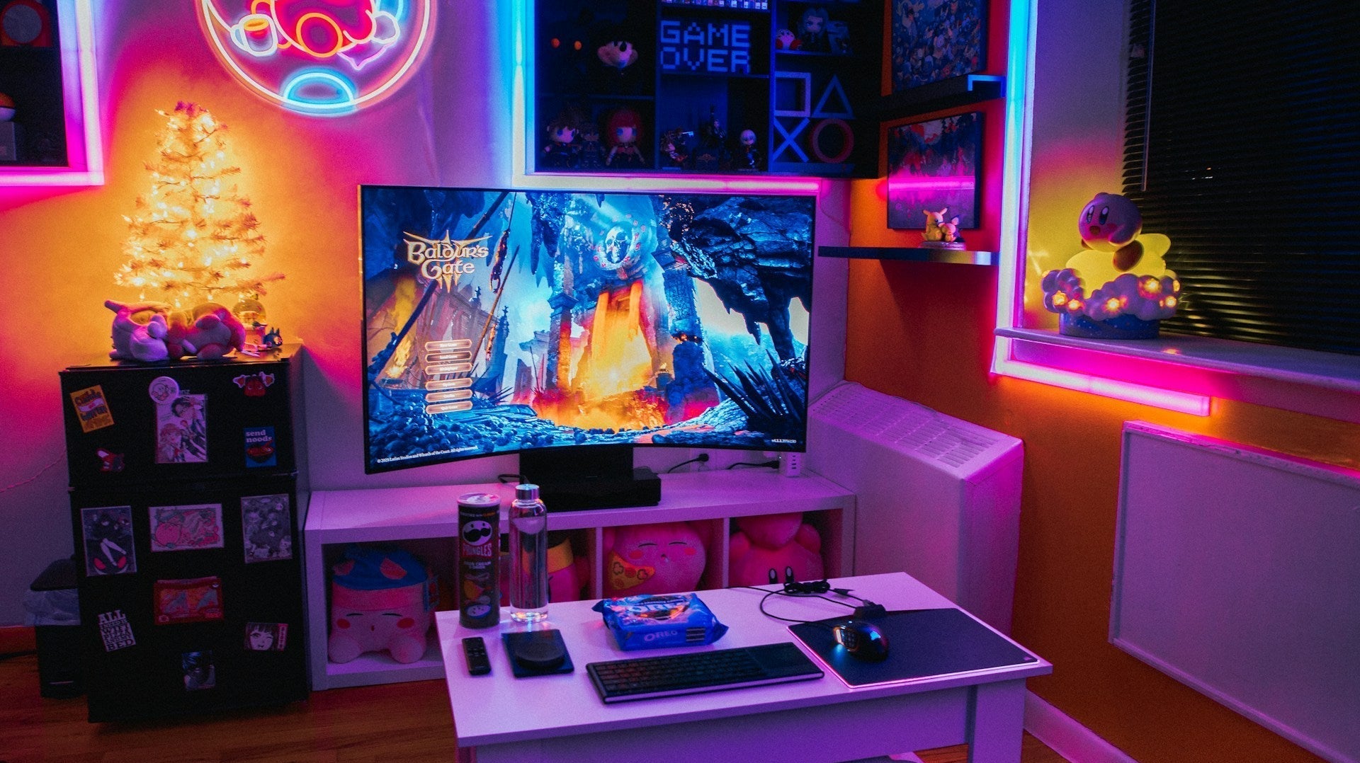 Vibrant gaming room with RGB lighting, plush toys, and a large screen showcasing creative gaming room decor ideas.