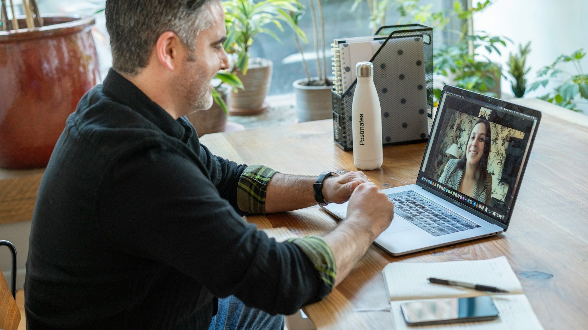 A man in a virtual work meeting for his work from home scientist job. Image by LinkedIn Sales Solutions via www.unsplash.com
