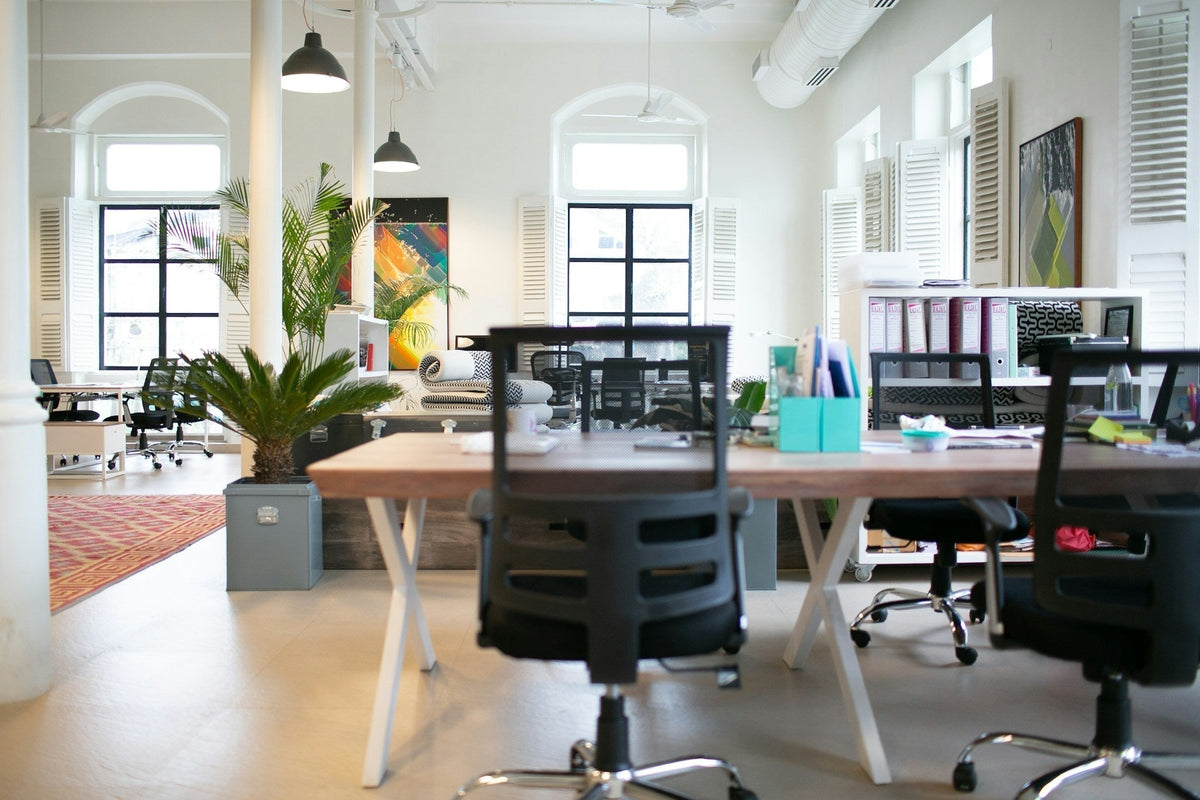 are office chairs good for posture? This pic shows a clean, well-organised office with a black office chair as the subject. Image by  Raj Rana via www.unsplash.com