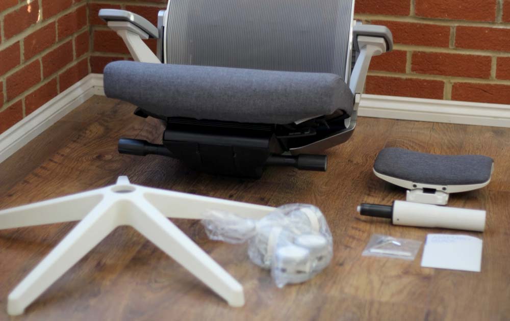 Step-by-step layout of chair parts, ideal for tutorials on how to disassemble office chairs for moving or repair.