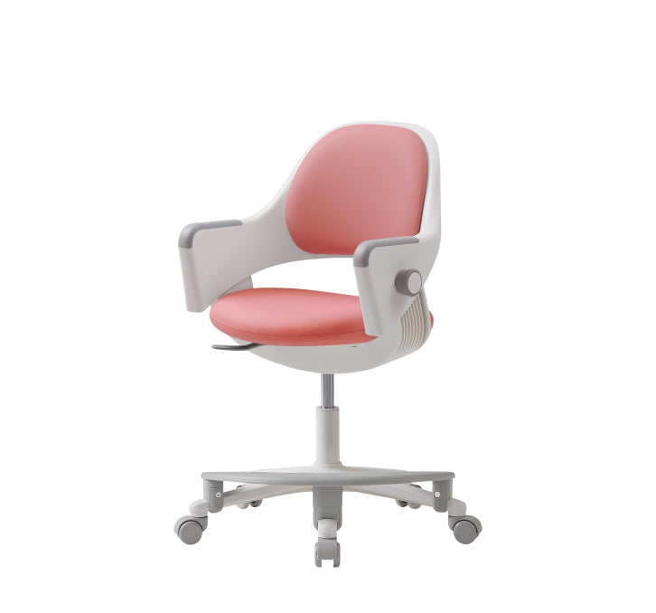 A white frame ergonomic kids chair with a pink seat and armrests, equipped with a footrest and self-locking casters.