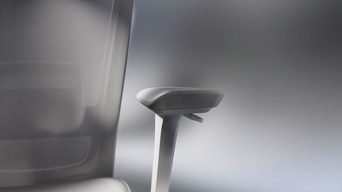 Waterfall armrest pad supporting the forearm