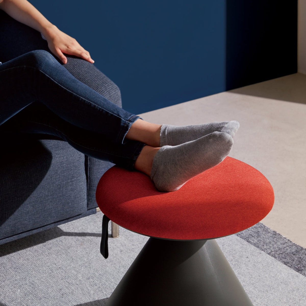 FUNGUS used as a compact stool beside the sofa