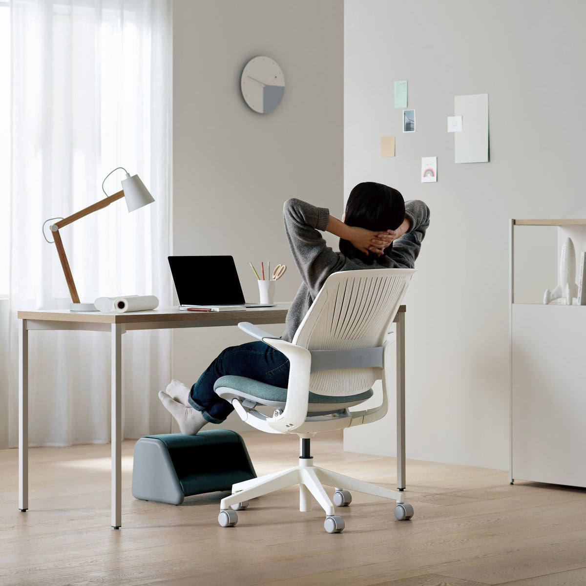 Person adjusting LINIE while seated
