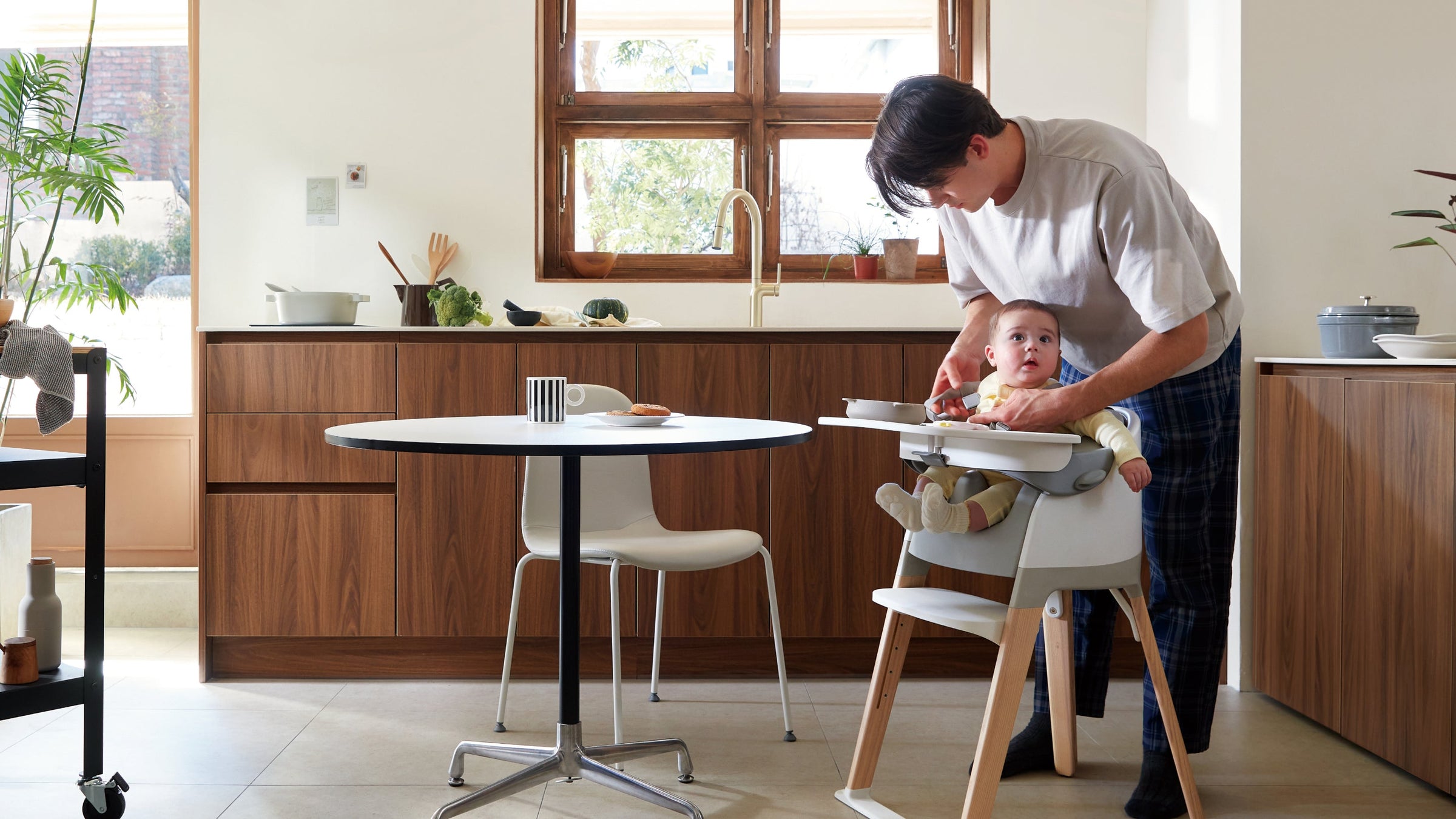 A SIDIZ growing chair in a relaxed family home