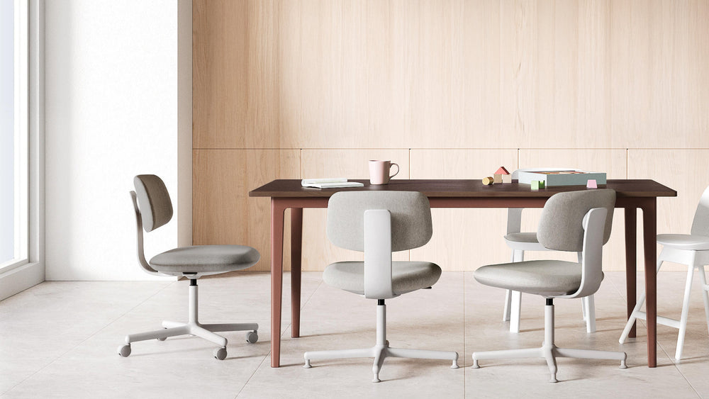 SIDIZ MUUVE chairs around a table in a calm home workspace