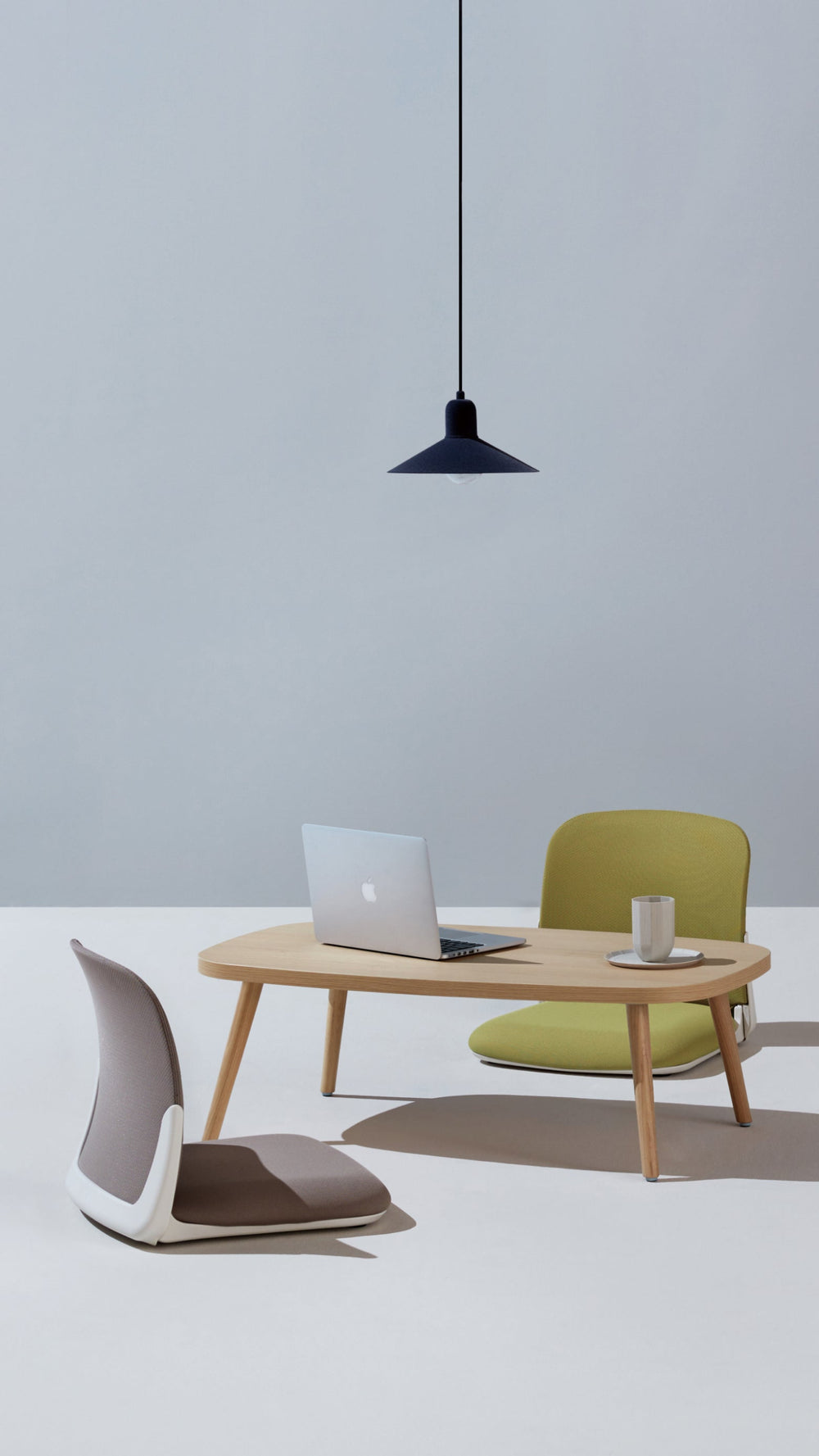 SIDIZ PILLO floor chair in a relaxed contemporary living space